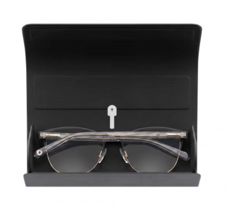 Aurio Smart glasses resting in their open charging case